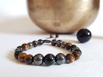 دستبند مردانه حدید و عقیق‌سلیمانی و چشم‌ببر